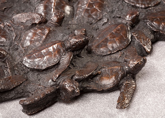 Race to the Sea mass hatching of baby sea turtles cast bronze sculpture